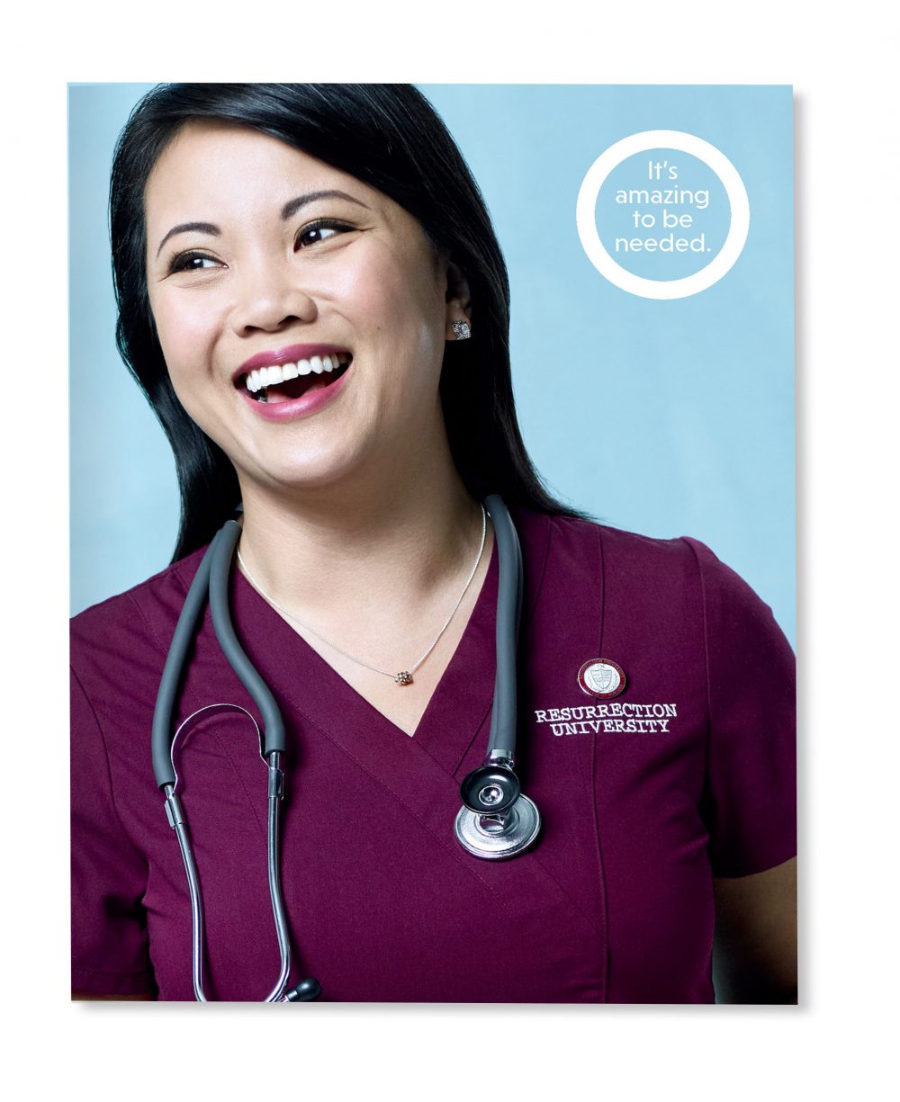Portrait of an Asian woman in red scrubs, with "It's amazing to be needed" text superimposed.